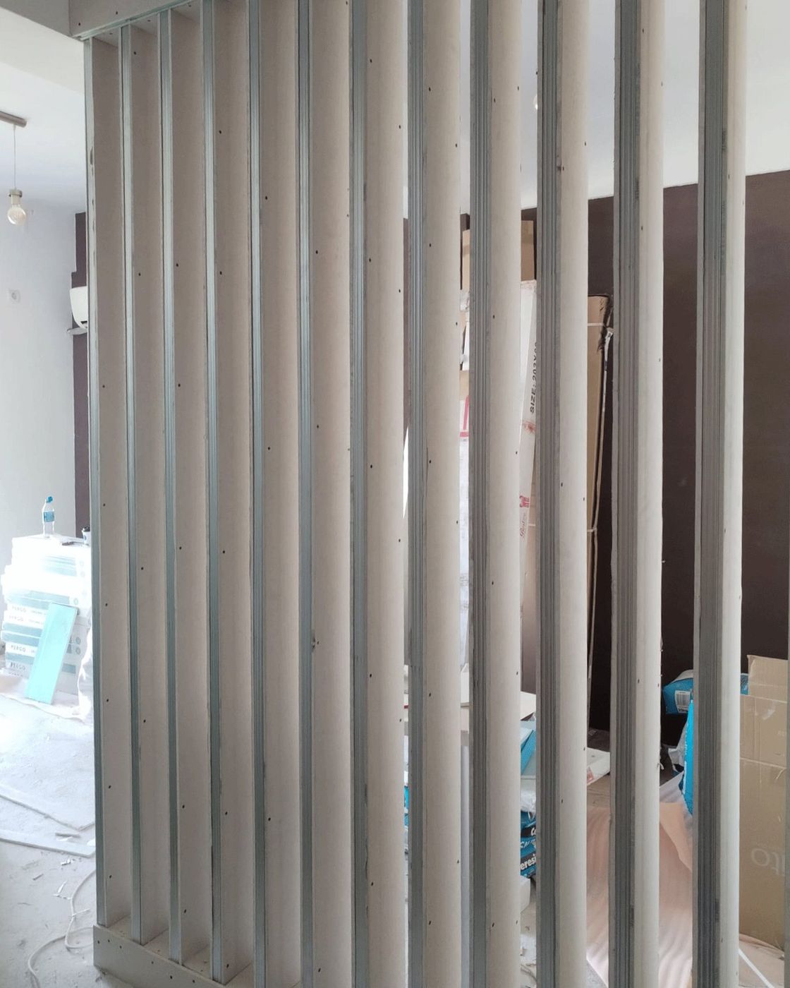 A closer view of the timber studs before cladding, set plumb at even centres, Studio Sakaia, Dubai