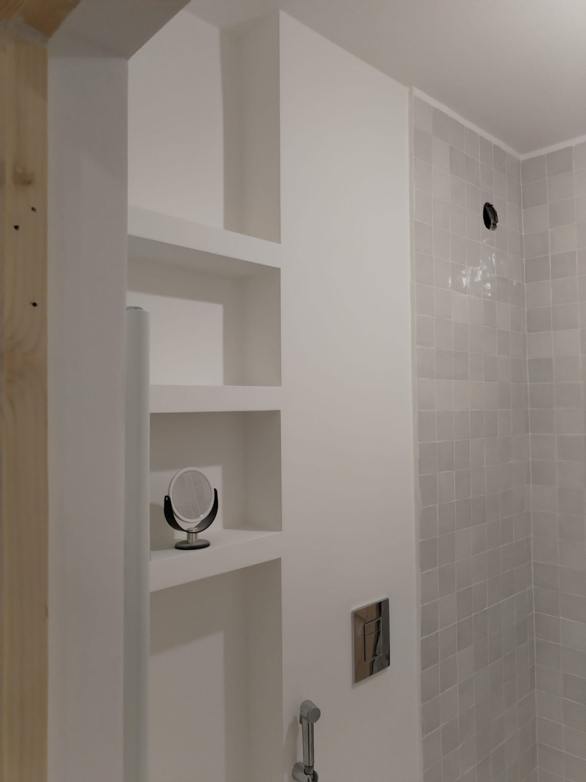 The niche and mirror placement tested against the tiled wall, Studio Sakaia, Dubai