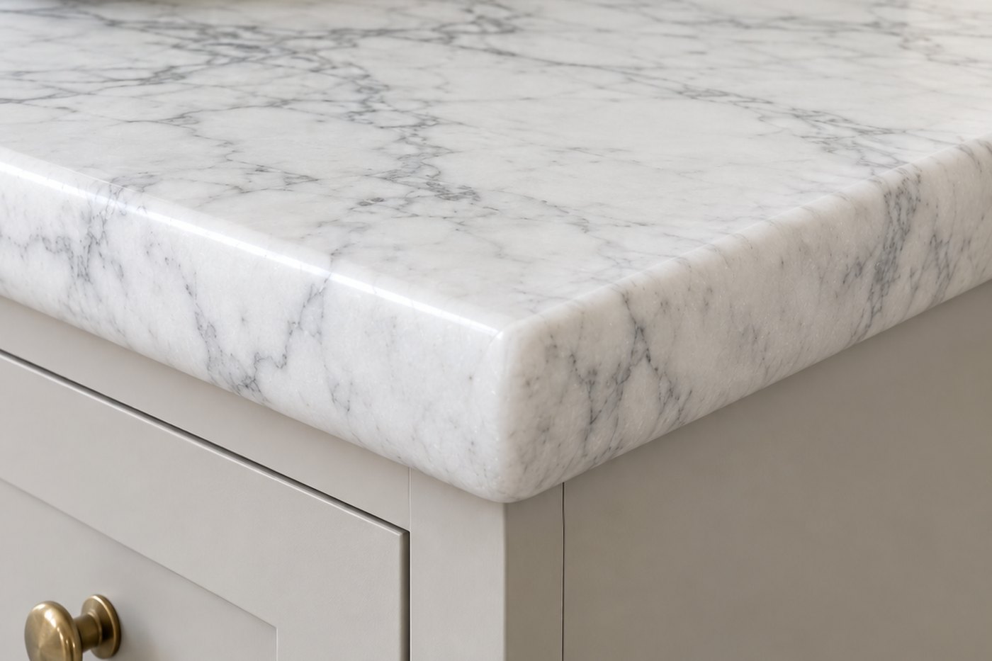 The same Calacatta countertop corner finished with a full bullnose edge, design visualisation by Studio Sakaia.