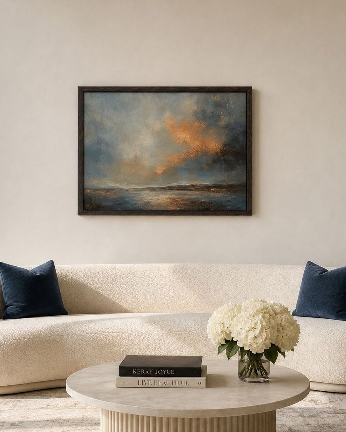 Living room with Dusk Amber artwork, navy cushions and a blue grey vintage rug sharing one palette.